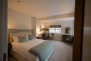 En eller flere senge i et værelse på Woodlands Cottage, Wynyard Hall + 56 billeder