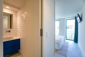 Et badeværelse på Loulé Luxury Garden W/ AC + 57 billeder