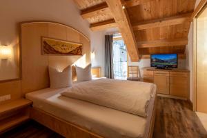 Posteľ alebo postele v izbe v ubytovaní Kirchwirt Appartements