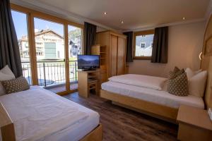 Posteľ alebo postele v izbe v ubytovaní Kirchwirt Appartements