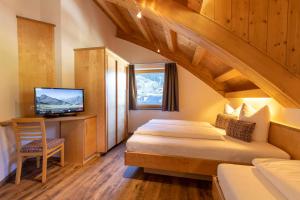 Posteľ alebo postele v izbe v ubytovaní Kirchwirt Appartements