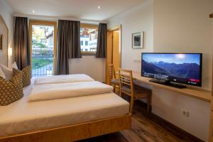 Posteľ alebo postele v izbe v ubytovaní Kirchwirt Appartements