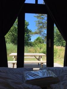 Balkón nebo terasa v ubytování Tiny House in het groen, aan zee met privé Hottub