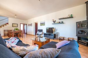 A television and/or entertainment centre at Finca Son Puca