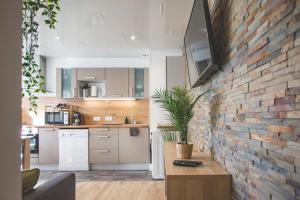 Kuchyňa alebo kuchynka v ubytovaní Bel appartement lumineux proche du centre-ville + 28 fotografií