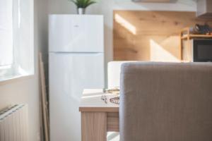 Kuchyňa alebo kuchynka v ubytovaní Bel appartement lumineux proche du centre-ville