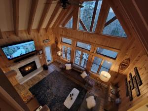 an overhead view of a living room with a fireplace at Loafers' Lodge in Carrabassett