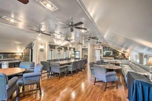 a dining room with chairs and tables and a ceiling at Efficiency Apt Shared Conference Room, Patio in Greenville
