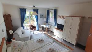 Televisyen dan/atau pusat hiburan di Ferienwohnung am Dresdner Elbhang