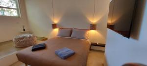 Posteľ alebo postele v izbe v ubytovaní Loft 19