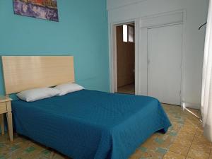 Voodi või voodid majutusasutuse Hotel San Carlos toas