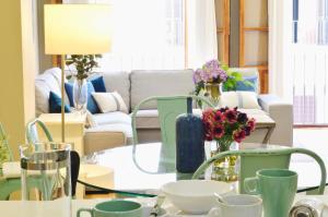 A seating area at HomeySeville-Penthouse Cathedral Tomas de Ibarra St 6 pax, Parking Optional