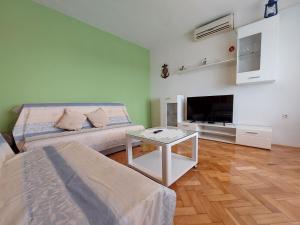 Postel nebo postele na pokoji v ubytování Apartments and Room Ivanka Petar