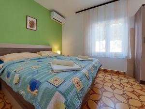 Postel nebo postele na pokoji v ubytování Apartments and Room Ivanka Petar