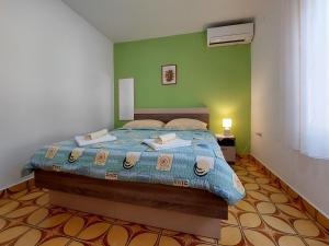 Posteľ alebo postele v izbe v ubytovaní Apartments and Room Ivanka Petar