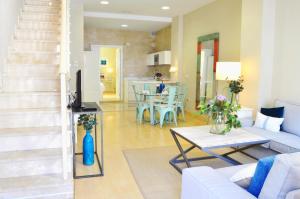 A seating area at HomeySeville-Penthouse Cathedral Tomas de Ibarra St 6 pax, Parking Optional
