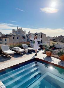 Bazén v ubytovaní Can Bordoy Grand House Hotel GL Preferred Hotel alebo v jeho blízkosti