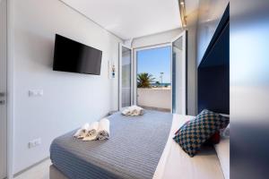 Posteľ alebo postele v izbe v ubytovaní Luxury Luce del Mare