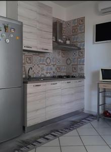 A kitchen or kitchenette at Angolo di Grecia