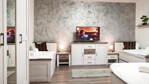 Telewizja i/lub zestaw kina domowego w obiekcie U Šípků