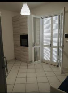 A television and/or entertainment centre at Angolo di Grecia