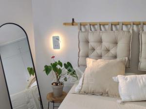 Posteľ alebo postele v izbe v ubytovaní Quiet Beachfront Apartment
