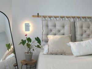 Posteľ alebo postele v izbe v ubytovaní Quiet Beachfront Apartment