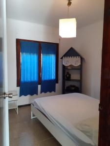 Postel nebo postele na pokoji v ubytování Villa Pordofo 2 chambres