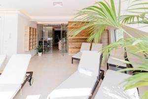 Predel za sedenje v nastanitvi R&R Residenzen HOTEL