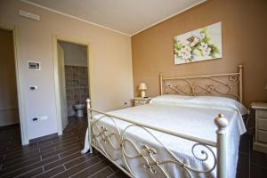 Posteľ alebo postele v izbe v ubytovaní B&B MALVETUM