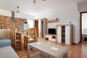 TV a/nebo společenská místnost v ubytování Casa Arivalde