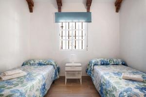 Posteľ alebo postele v izbe v ubytovaní Apartamento en la playa 2
