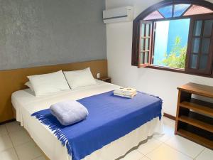 Letto o letti in una camera di Pousada Bugio
