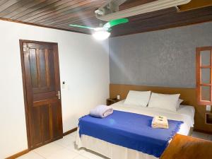 Letto o letti in una camera di Pousada Bugio