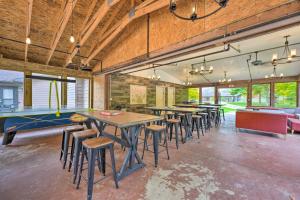 a room with tables and chairs and a pool table at Pet-Friendly Cassopolis Escape with Lake Access in Cassopolis
