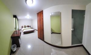 Voodi või voodid majutusasutuse Apartahotel Vincent Suites toas