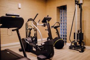 a gym with several exercise bikes in a room at Sandton Eindhoven Centre in Eindhoven