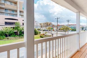 a balcony with a view of a street at Ocean City Charmer in Ocean City