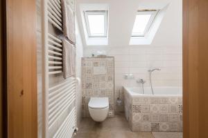 Koupelna v ubytování Ayni apartman + 11 fotografií