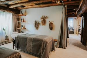 Postel nebo postele na pokoji v ubytování Aldea Kuká, Luxury Eco Boutique Hotel