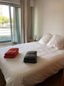 Posteľ alebo postele v izbe v ubytovaní T2 Cosy Mer Plage Plérin St Brieuc