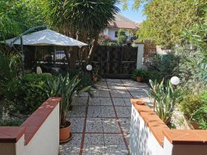 A garden outside Villa Iris - Mondello