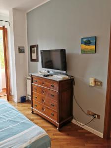 A television and/or entertainment centre at Villa Iris - Mondello