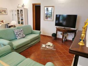 A television and/or entertainment centre at Villa Iris - Mondello