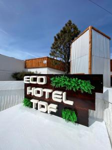 ecohoteltdf في ريو غراندي: علامة الفندق أمام المبنى