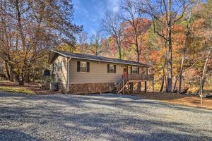 a small house on the side of a road at Creekside Retreat with Deck, 18 Miles to Wolf Ridge in Weaverville