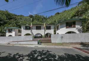 a house on the side of a street at Tetsuya in Ogasawara