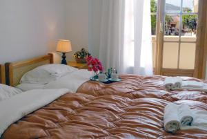 Кровать или кровати в номере Le Due Sorelle
