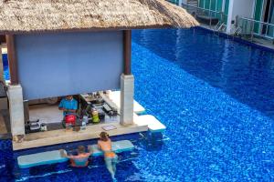 Bazén v ubytování The Sakala Resort Bali All Suites nebo v jeho okolí