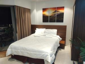 Letto o letti in una camera di Tambuli Residence